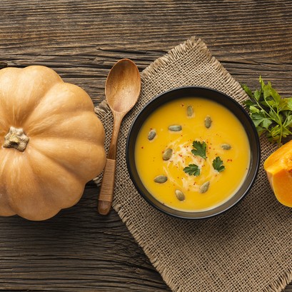 flat-lay-pumpkin-soup-in-bowl-with-pumpkin.jpg